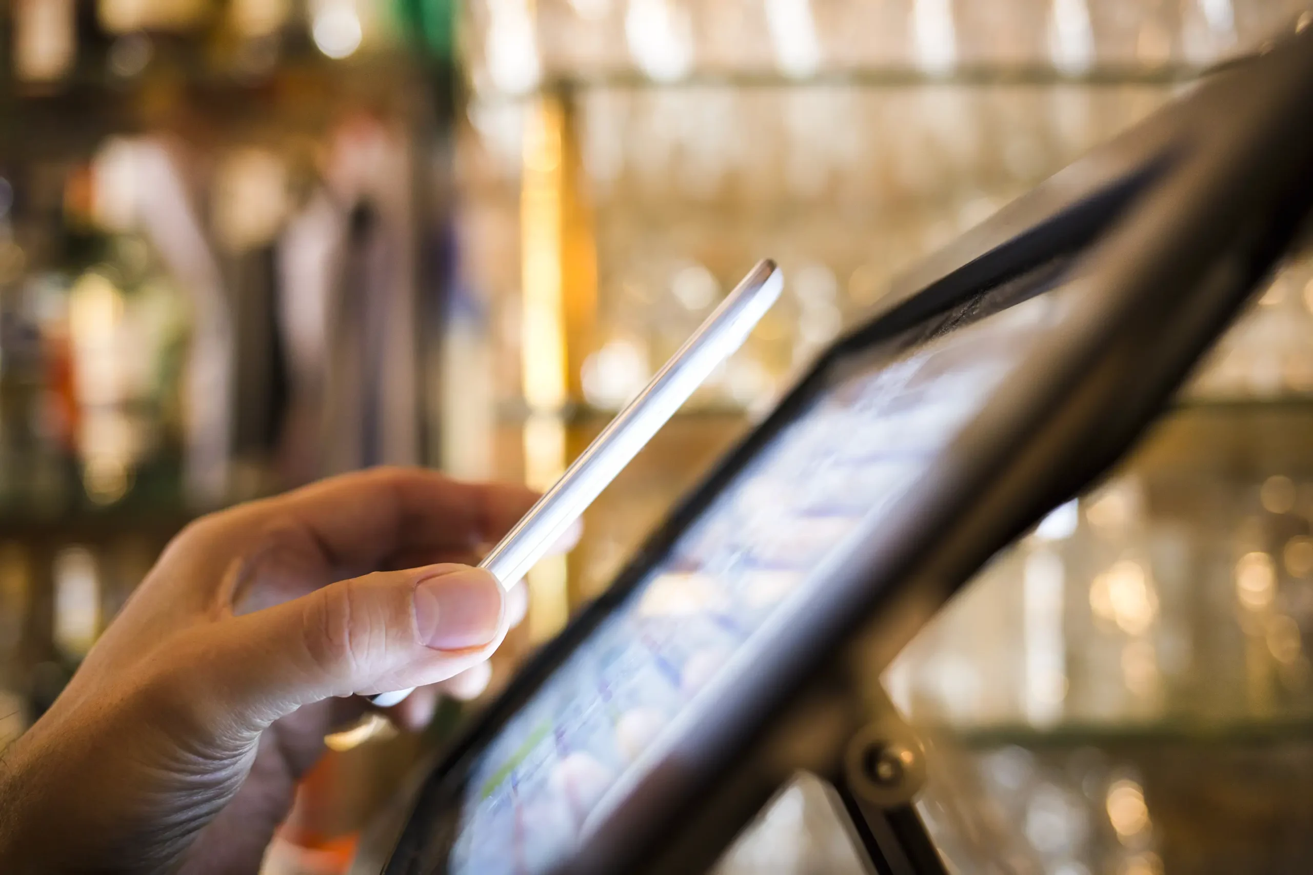 A close-up of an RFID card being scanned by a reader, illustrating secure access technology.