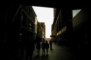 Dark urban alleyway , symbolizing hidden threats and unseen digital activity.