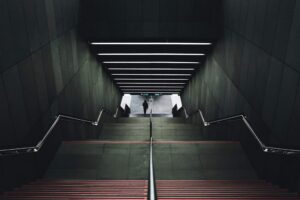 Dark underground stairway representing hidden SaaS security vulnerabilities and cloud dependencies