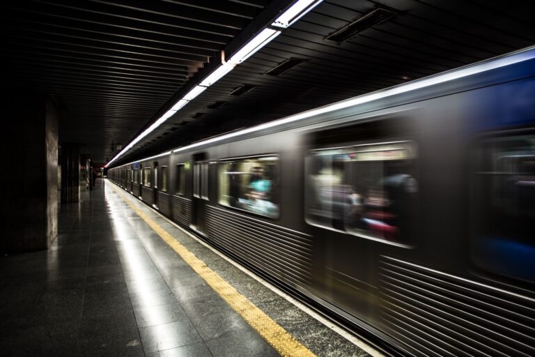 Blurred train in motion, symbolizing machine-scale speed in AI red teaming
