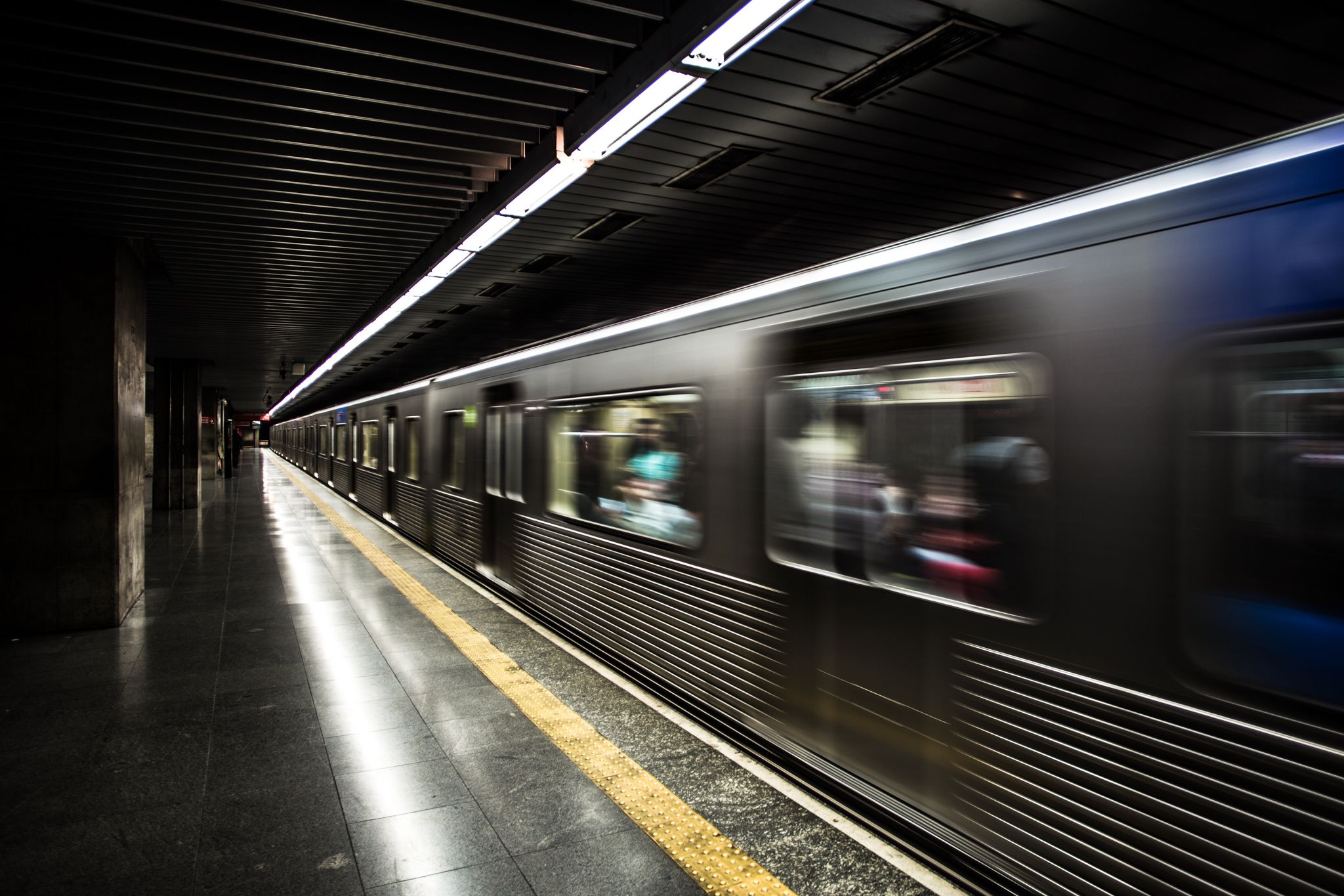 Blurred train in motion, symbolizing machine-scale speed in AI red teaming