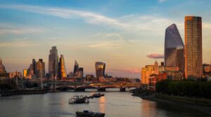 The City of London skyline at dusk, evoking the scale of digital infrastructure an insurance giant trusted to stay secure.